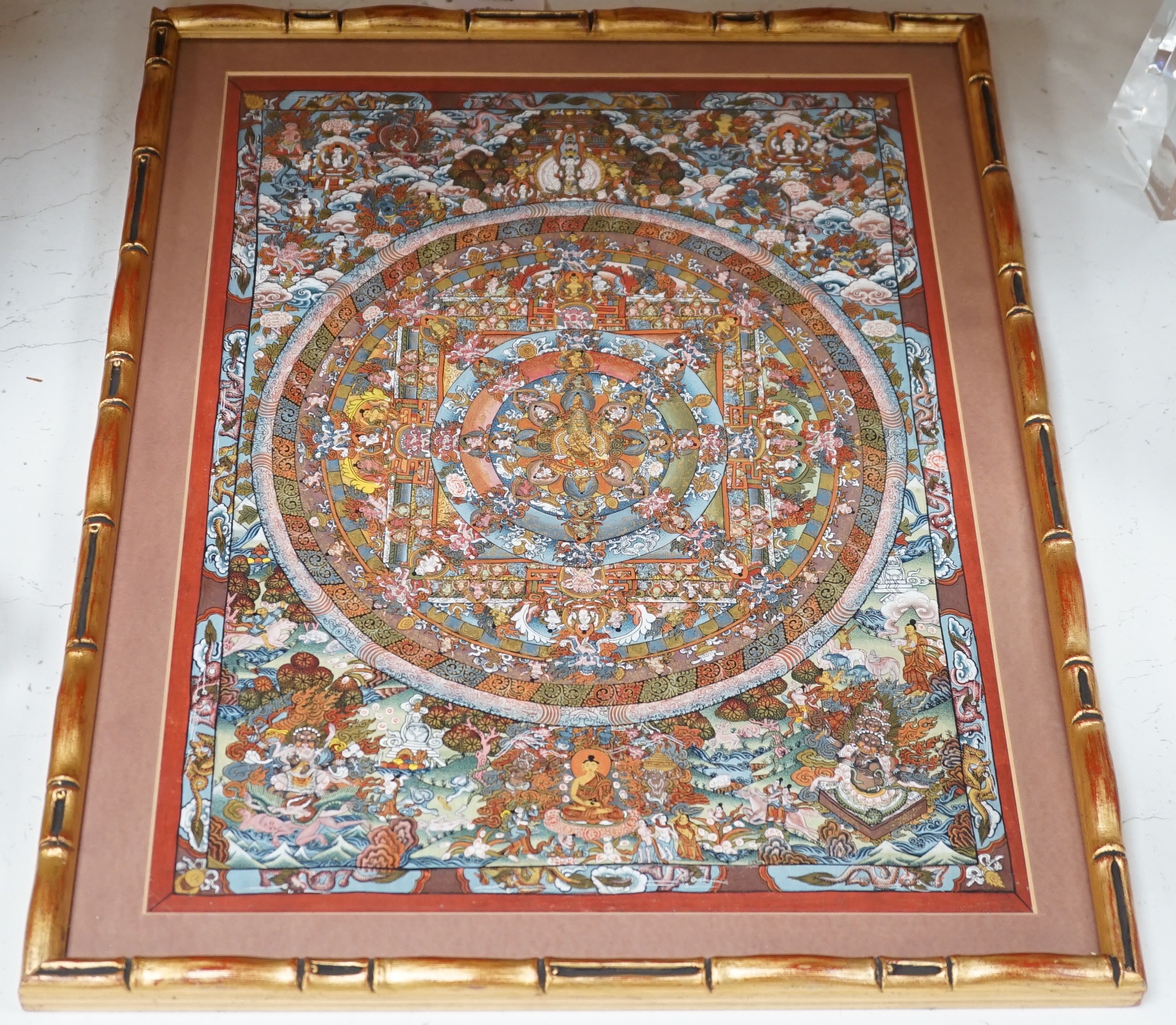 A Nepalese Mandala Thangka, framed. 42x31cm excl frame.